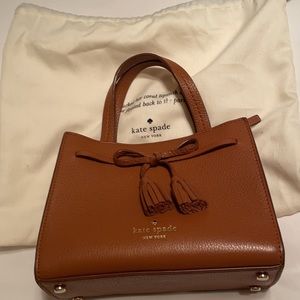 Adorable Kate Spade bag in a cognac color